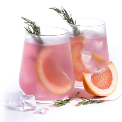 Grapefruit cocktail isolated on white background